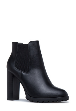 heeled booties with lug soles