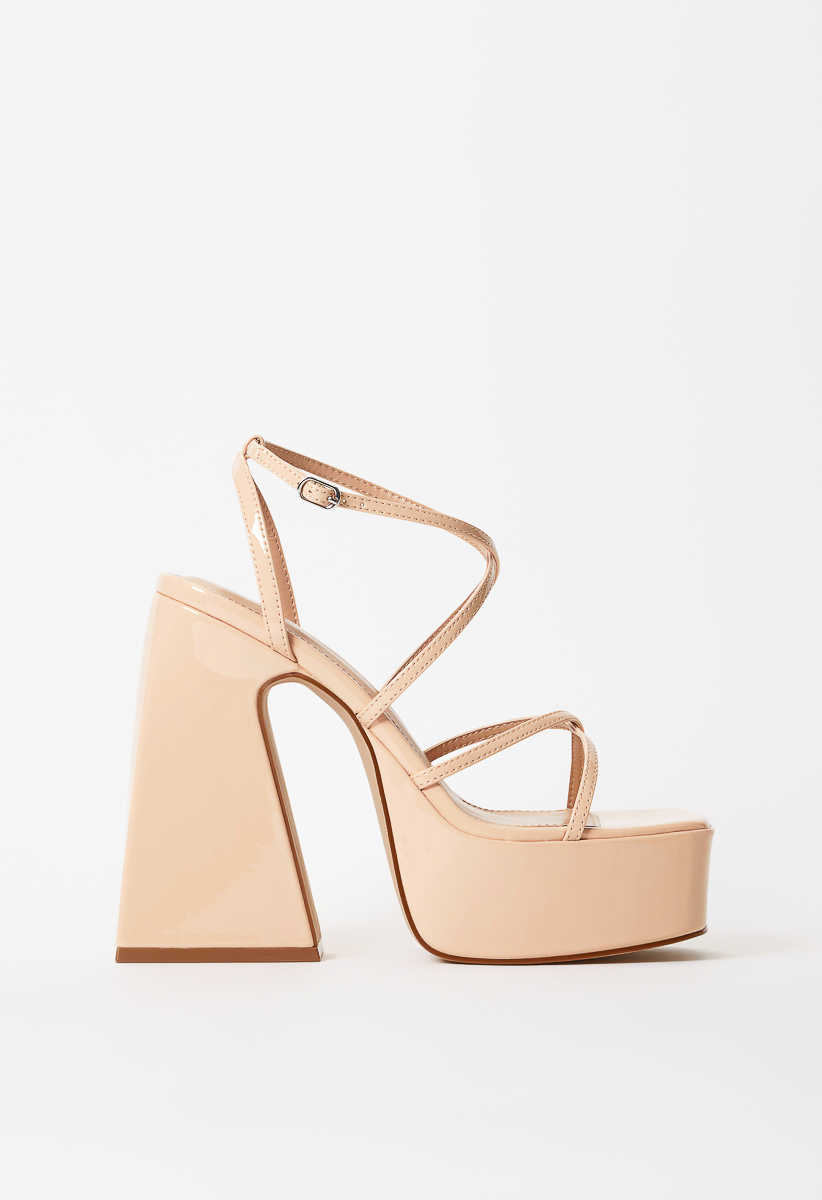Public Desire Wide Fit Elevate heeled sandals with bow in clear and beige |  ASOS